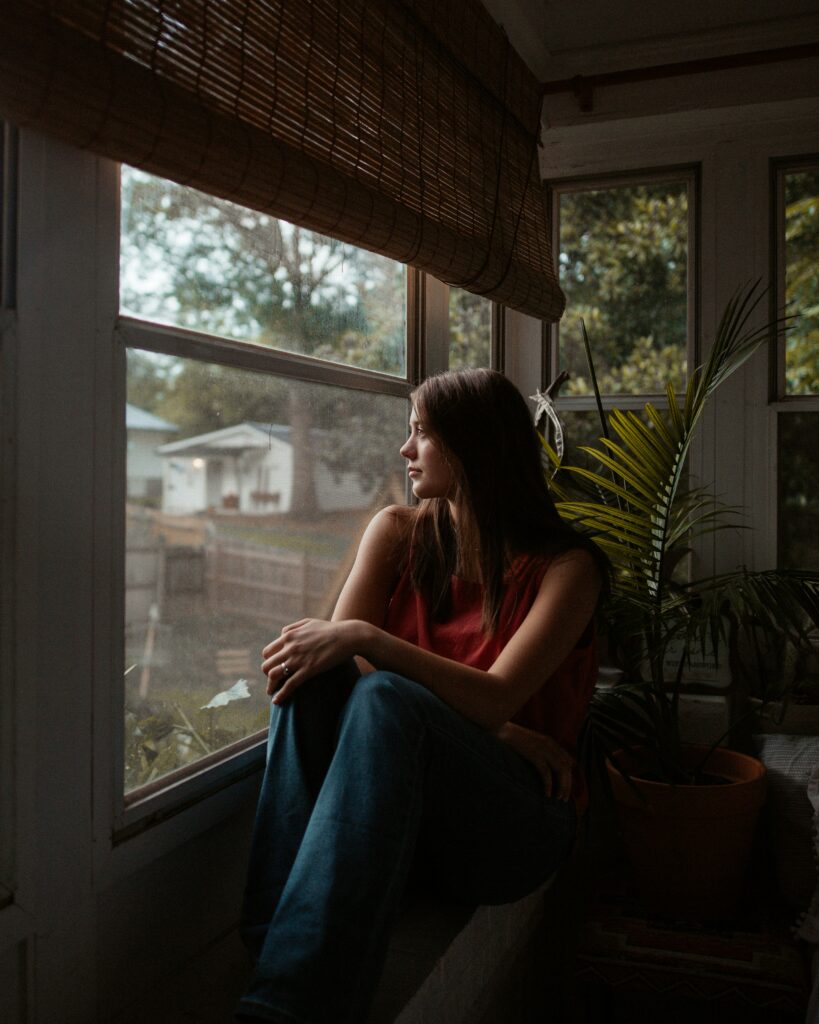 Woman looking out of the window