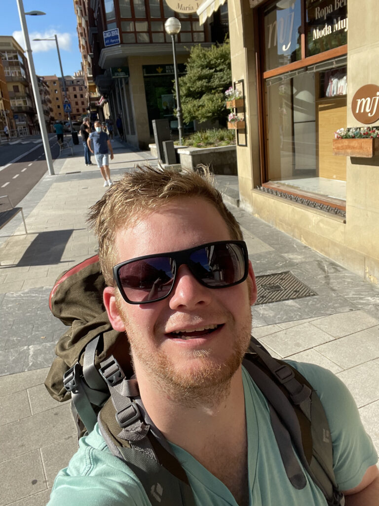 Daniel selfie with backpack